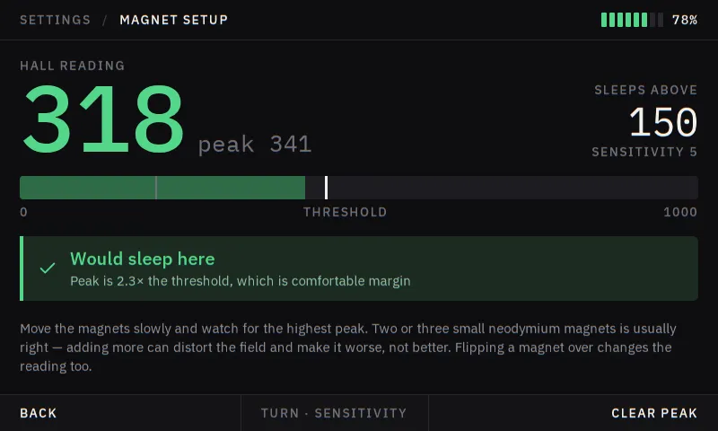 Magnet setup screen: Tuning the sleep magnet against the live hall reading, with the threshold marked and the peak held so you can find it by moving slowly.